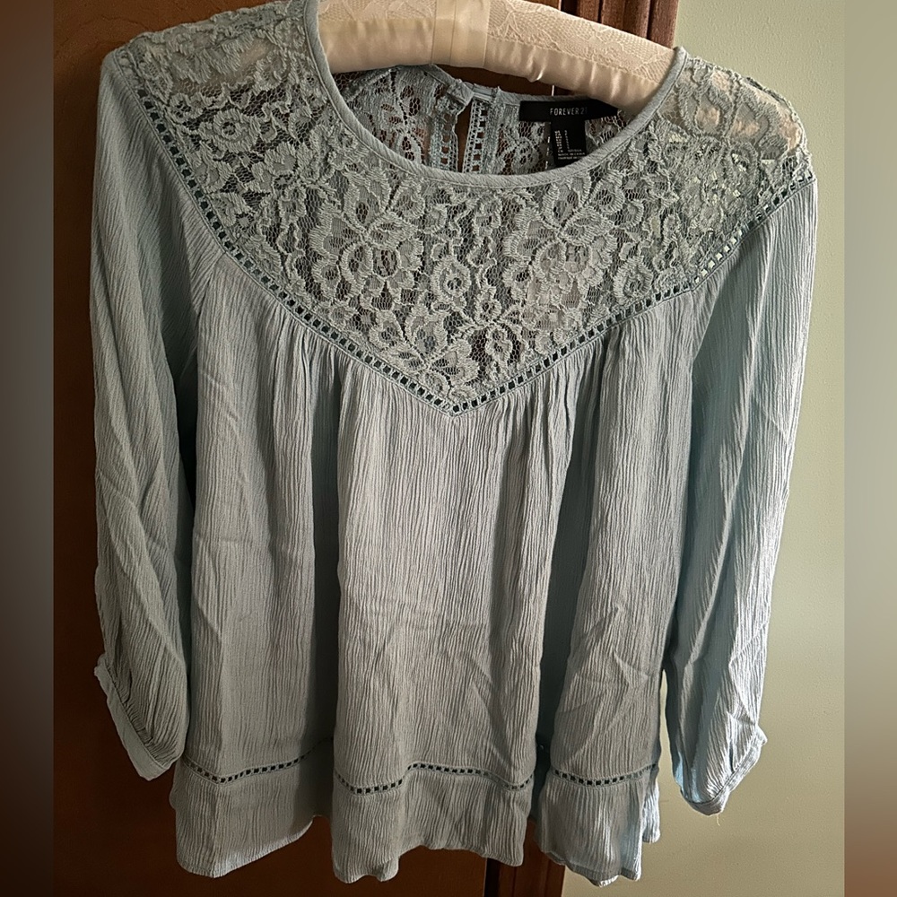 NWT Forever 21 small woven top dusty blue long sleeve. Lace detail